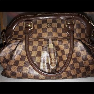 Women’s Louis Vuitton Damier Canvas Trevi PM bag.